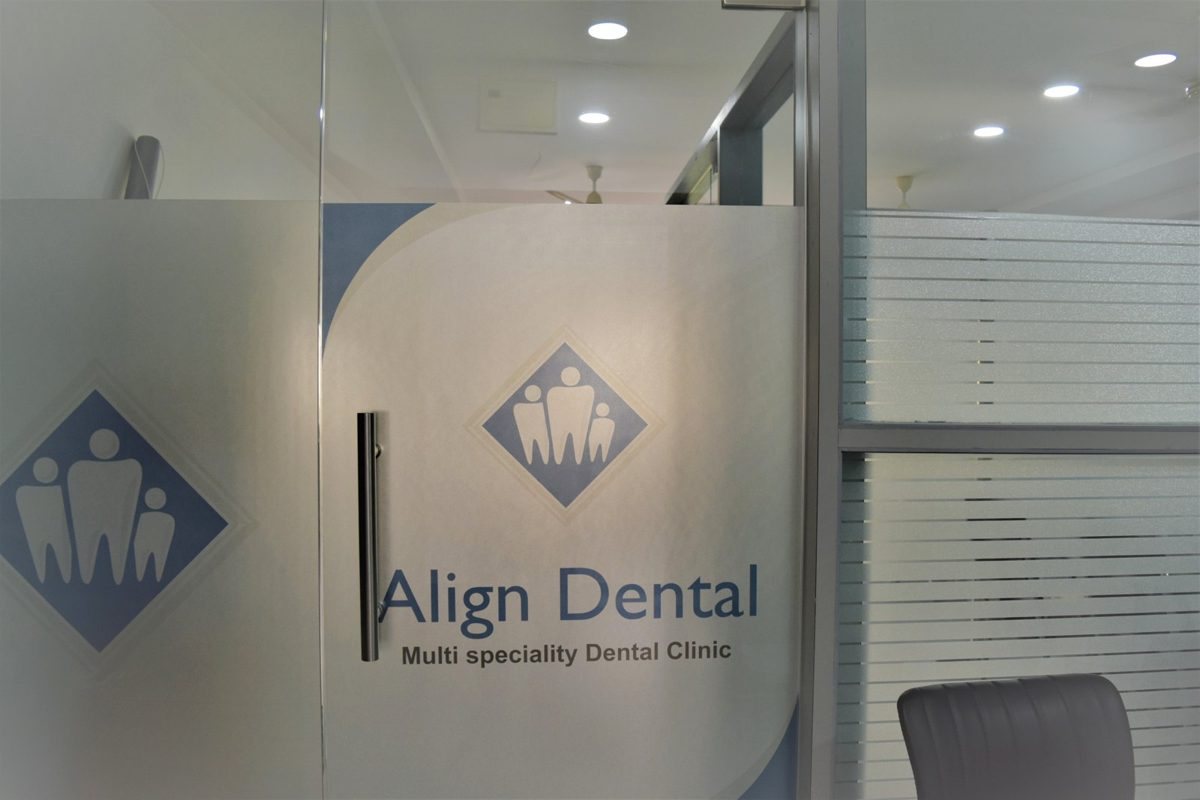 The branded glass partition inside Align Dental, Madhapur