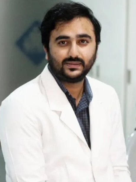 Dr. D. Praneeth Reddy in a white coat at Align Dental